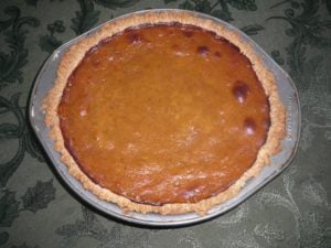 butternut squash pie in a pan on a table