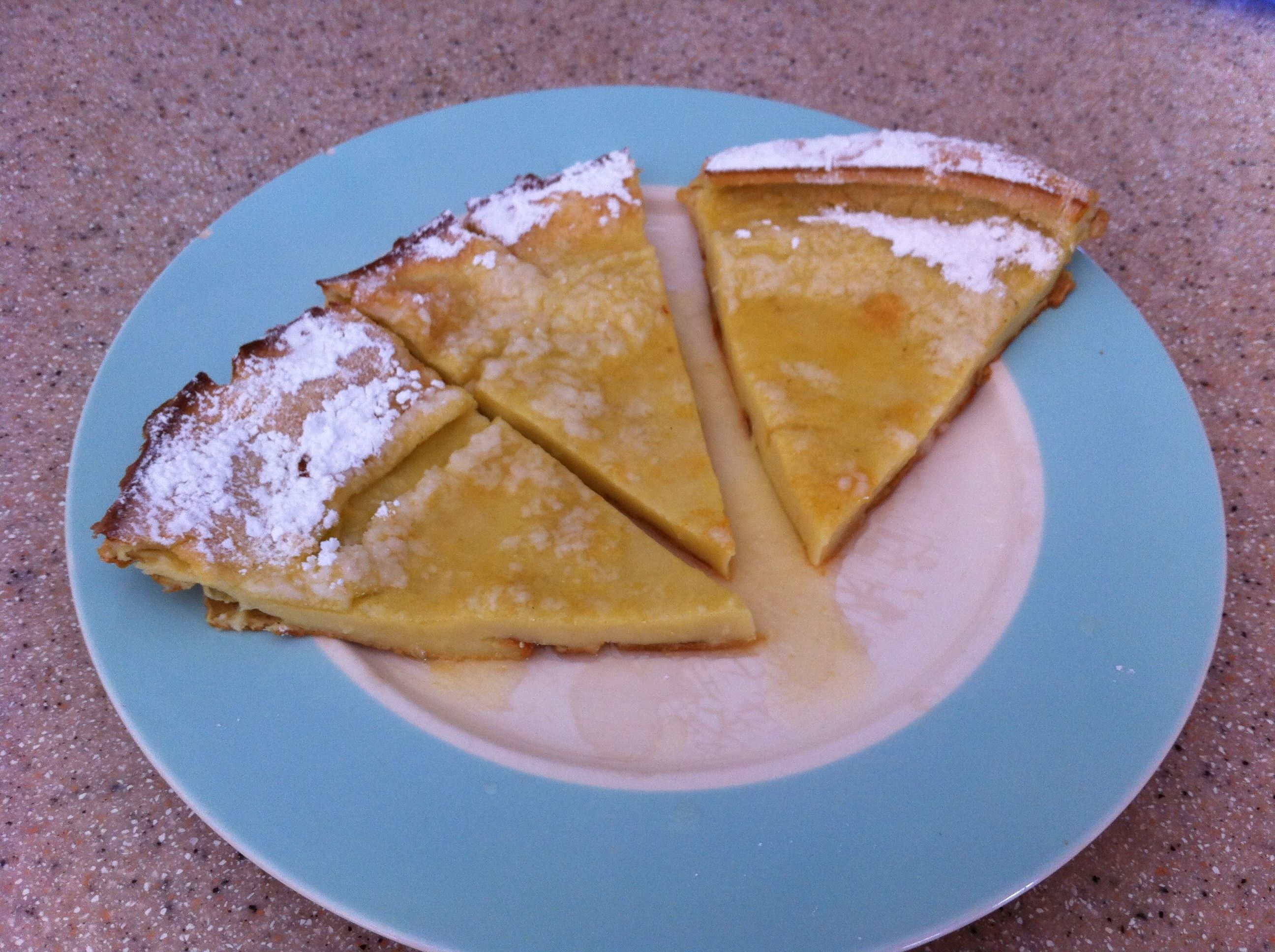 Image of 3 slices of German Pancake on a blue plate.