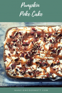 Pumpkin Poke Cake with Whipped Cream, Pecans, and Caramel Sauce