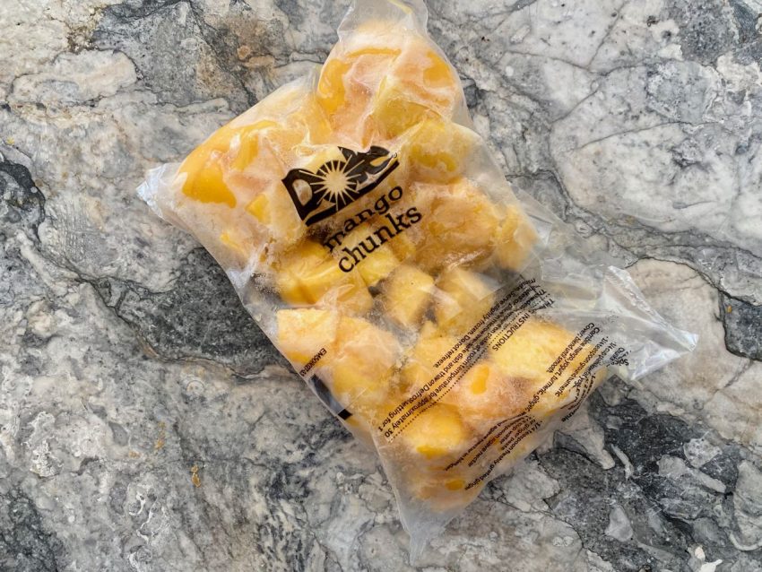 frozen mango chunks in a plastic bag from Dole